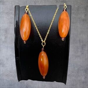Gold plated long brown earrings set with crystal accents